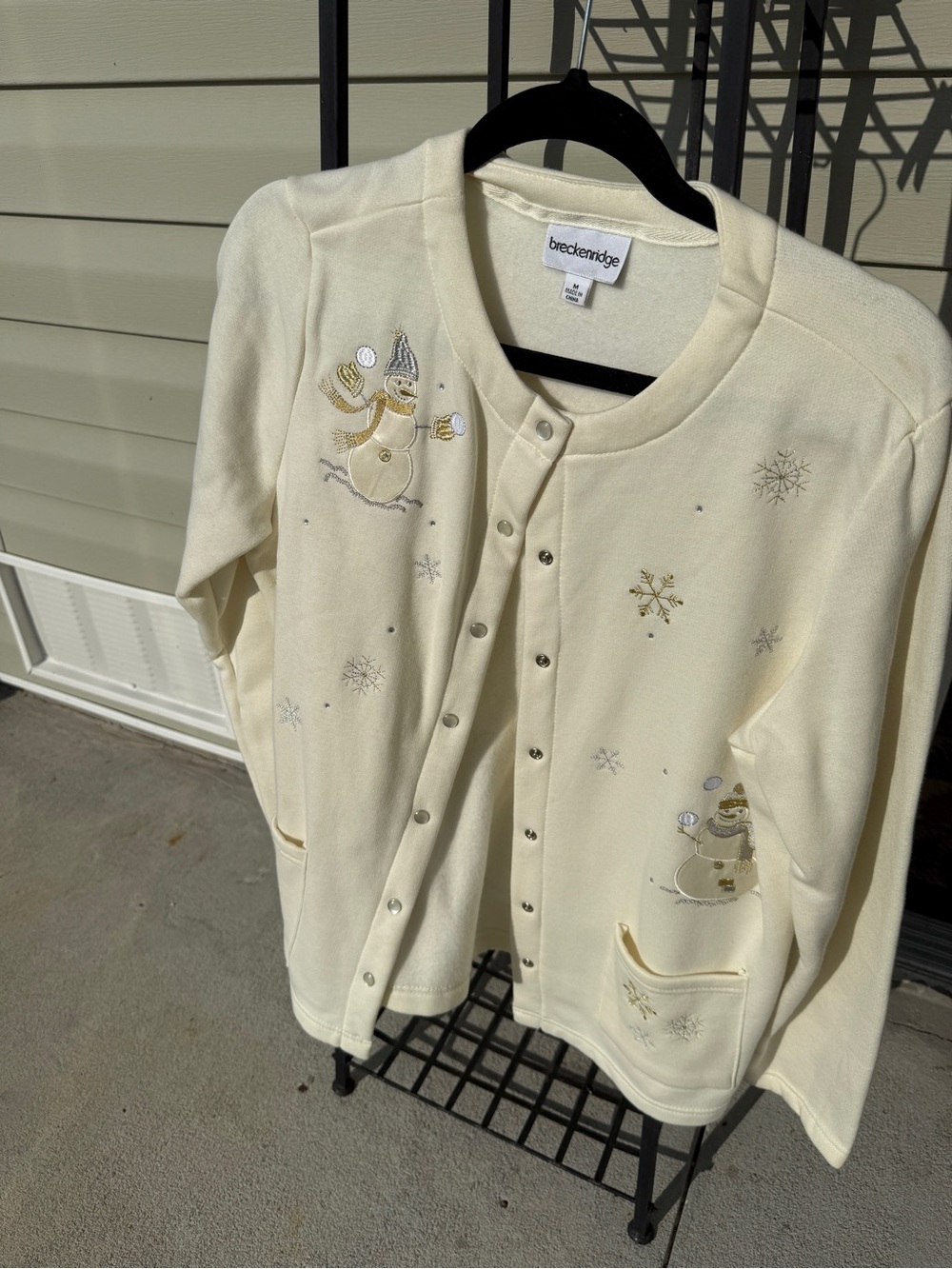 Breckinridge cream colored snap front cardigan